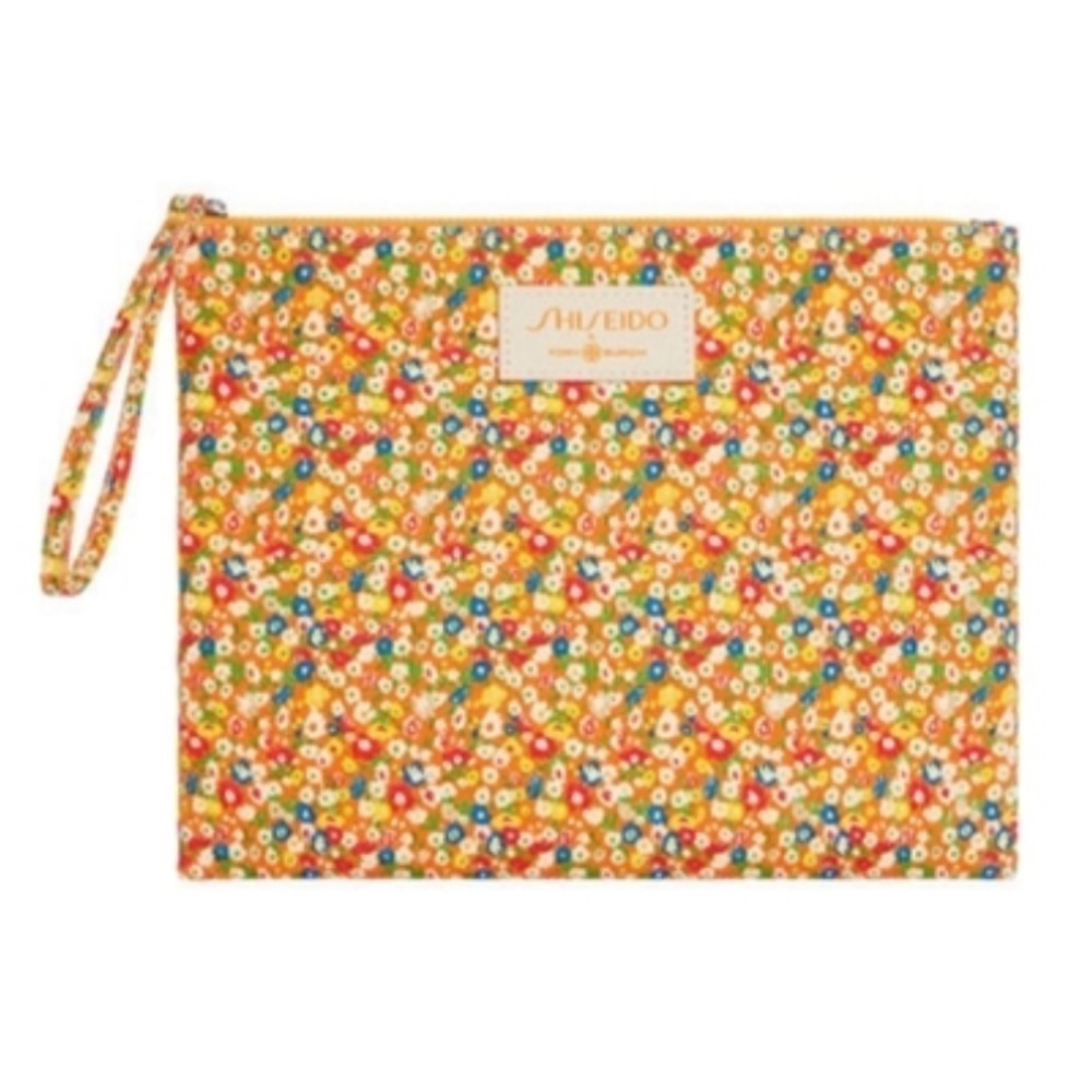 SHISEIDO & TORY BURCH FLORAL WRISTBAND / COSMETICS BAG .
